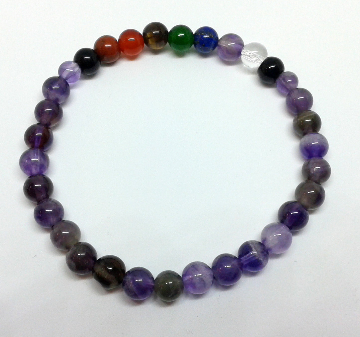Chakra Bracelet - 1 sequence Surrounded by Amethyst 6 mm beads