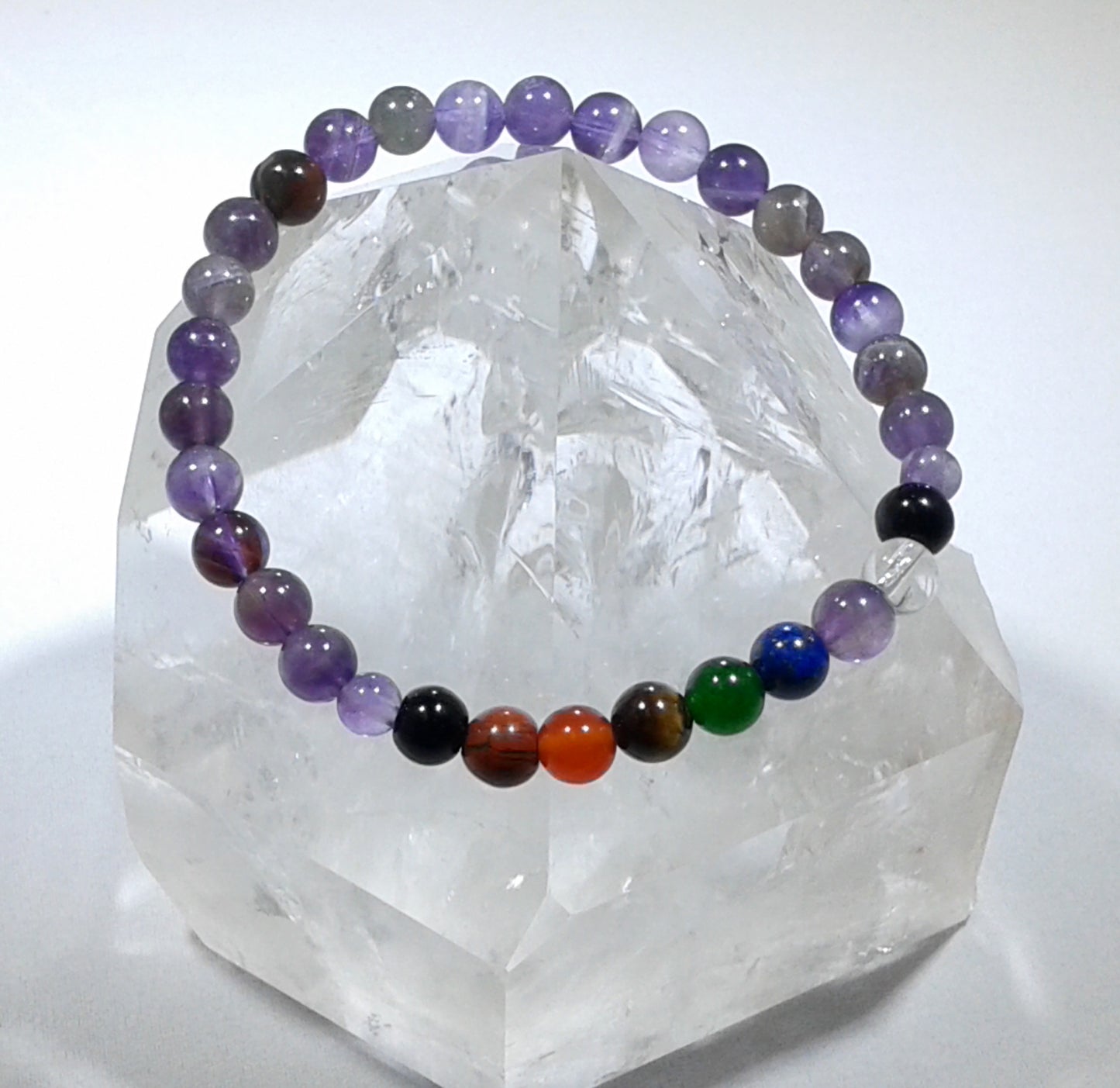 Chakra Bracelet - 1 sequence Surrounded by Amethyst 6 mm beads