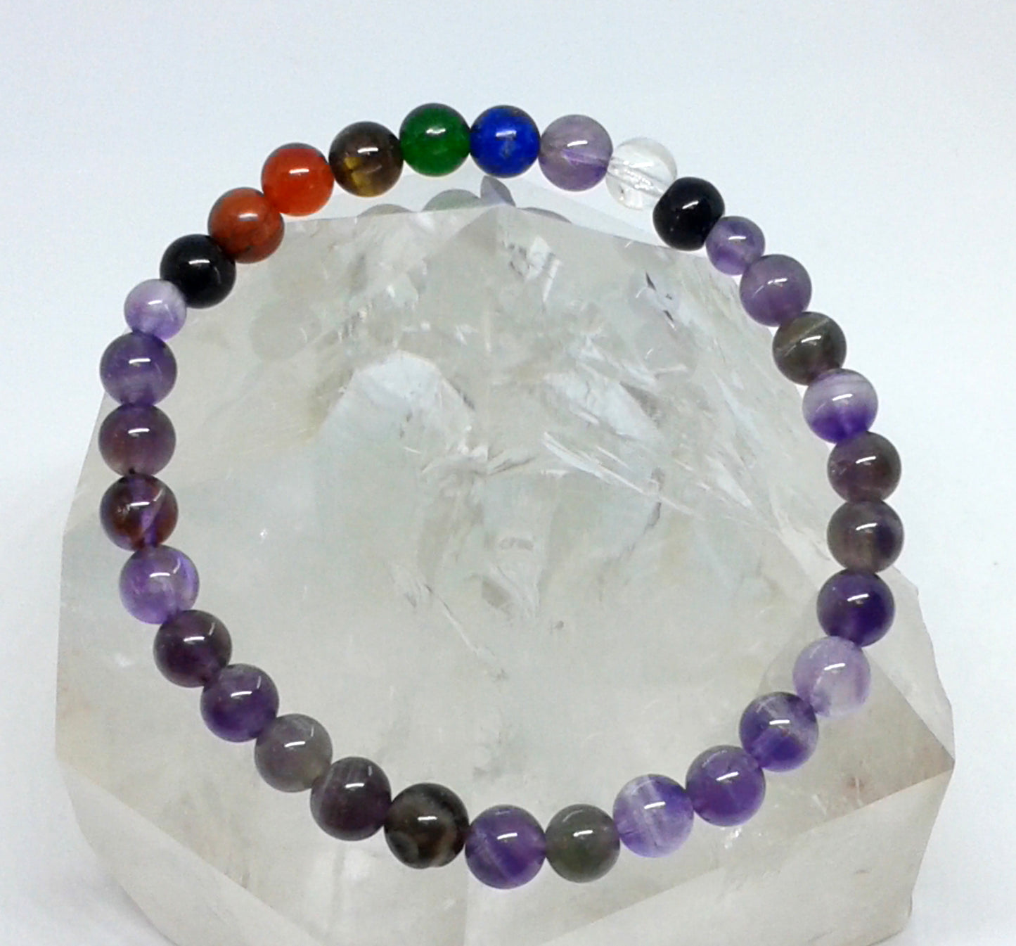 Chakra Bracelet - 1 sequence Surrounded by Amethyst 6 mm beads
