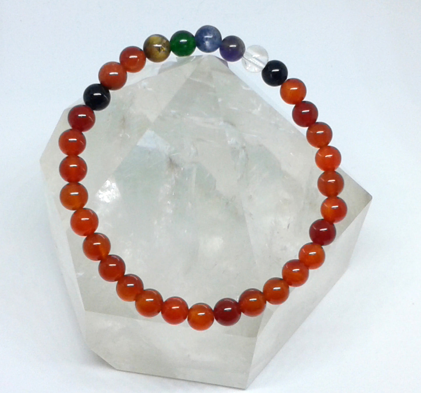 Chakra Bracelet - 1 sequence Surrounded by Carnelian 6 mm beads