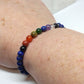Chakra Bracelet - 1 sequence Surrounded by Lapis Lazuli 6 mm beads